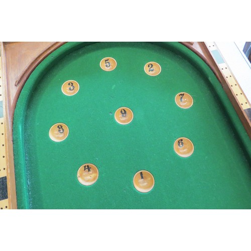 1096 - A folding table-top bagatelle table by E.J. Riley Ltd