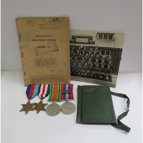 8544 - A group of WWII medals, documents and diary etc to WOII M. DUTTON MID. REME