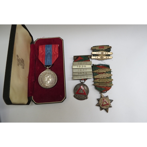 8548 - An Imperial Service Medal, cased with framed award document and various driving medals to Rupert Les... 