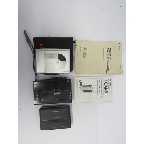 5428 - A Sony MZ-R37 portable minidisc recorder, Aiwa HS-PX310 portable cassette recorder (hinge damaged) a... 