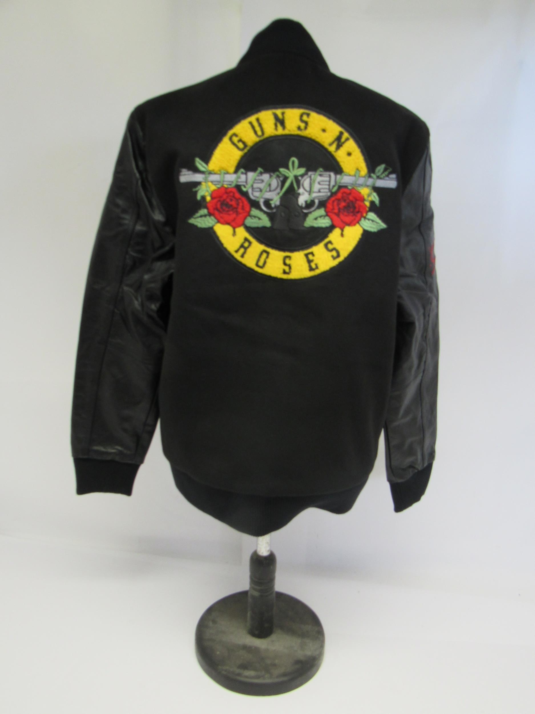 GUNS N ROSES: A black varsity style jacket with leather sleeves 