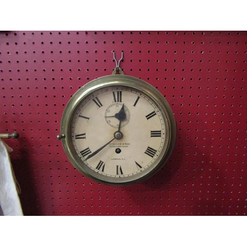 4102 - A Reynolds & Son, London, brass cased ship's clock