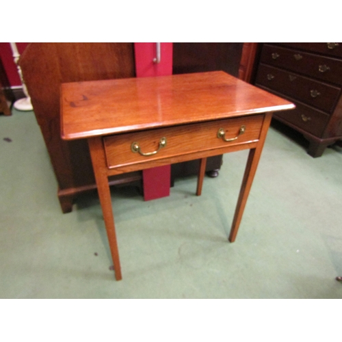 4063 - A circa 1860 English elm and oak side table, the single frieze drawer over square tapering legs, 75c... 