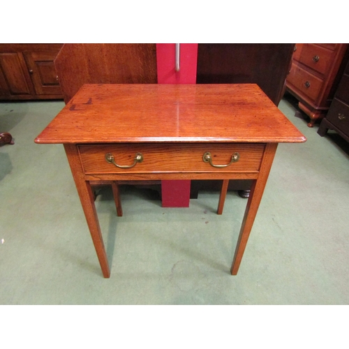 4063 - A circa 1860 English elm and oak side table, the single frieze drawer over square tapering legs, 75c... 