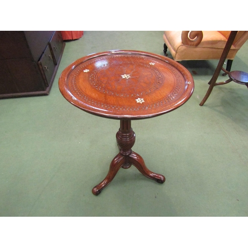 4073 - A tripod wine table with Eastern influence carved top, wrythen and turned support, 64cm tall x 48cm ... 