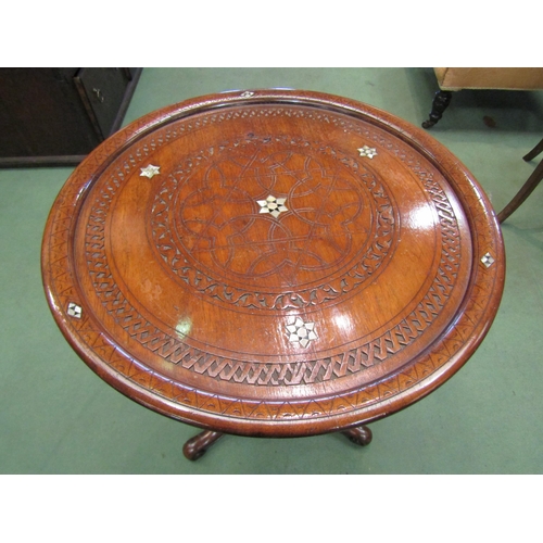 4073 - A tripod wine table with Eastern influence carved top, wrythen and turned support, 64cm tall x 48cm ... 