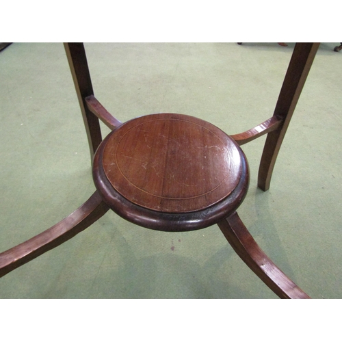 4079 - An Edwardian walnut occasional table with under-tier, 72cm tall x 55cm