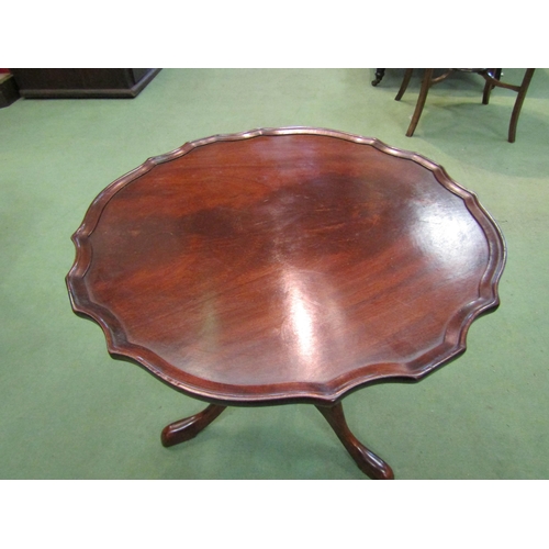 4107 - A George III style flame mahogany piecrust edge top occasional table on turned column and tripod bas... 