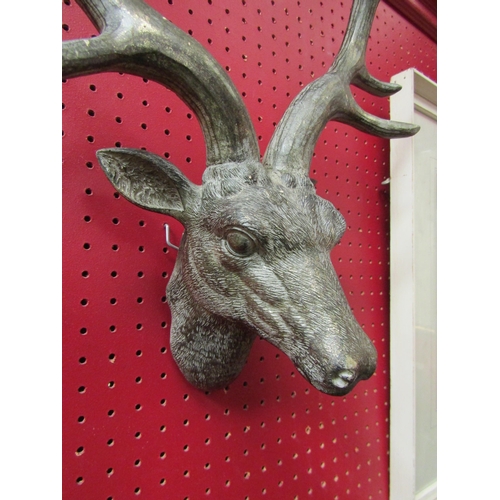 4117 - A bronzed resin deer's head, 41cm high, 35cm wide