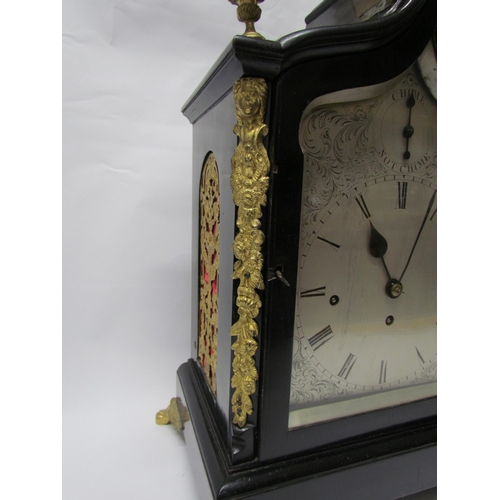 8052 - An 18th Century English ebonised bracket clock with cast brass feet, finials and side fret panels, s... 