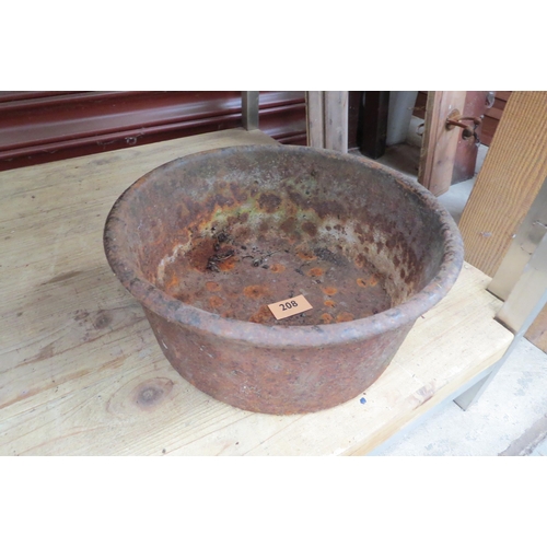 3599 - A cast iron bowl, 26cms diameter