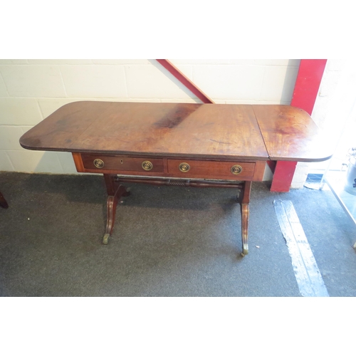 1021 - A 19th Century Regency mahogany sofa table with twist support, two true and two faux drawers, 73cm h... 