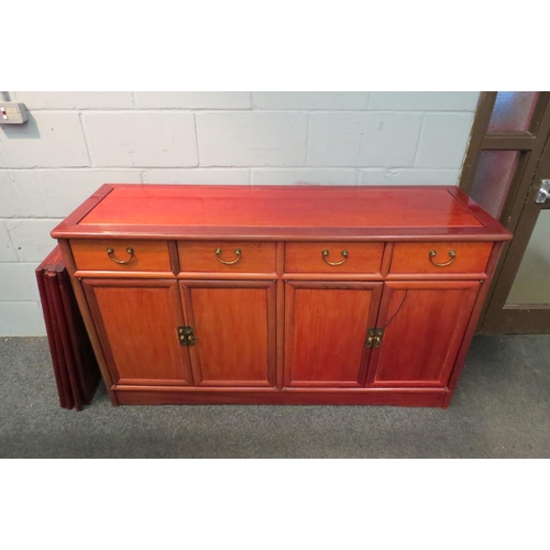 1103 - A modern Oriental style sideboard, four drawers over four cupboard doors, 85cm tall x 151cm wide x 4... 