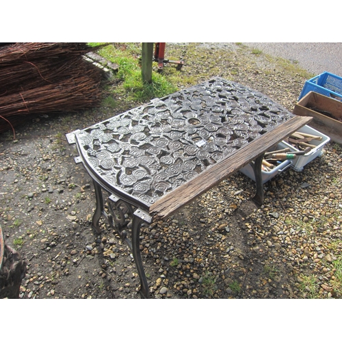 3540 - A cast ended and topped garden table with rose decoration, a/f