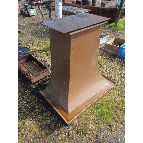 3543 - A copper fire hood and a cast curb