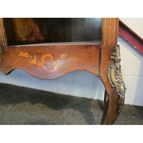 1010 - An Edwardian walnut sideboard, marquetry ribbon with swag and foliage, the bow fronted central door ... 