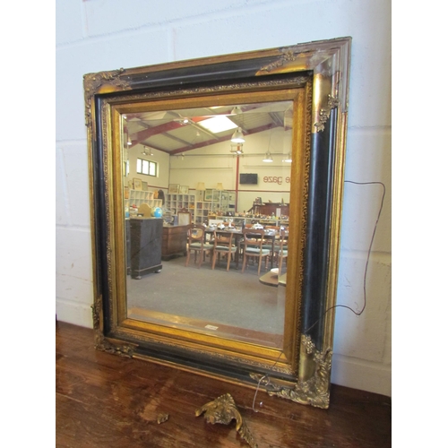 1018 - A gilt and ebonised rectangular wall mirror, 67cm x 57cm total, frame a/f    (E)  £20-30