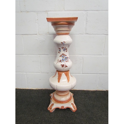 1051 - An Italian ceramic jardiniere stand decorated with flowers, 81cm tall     (R)  £25