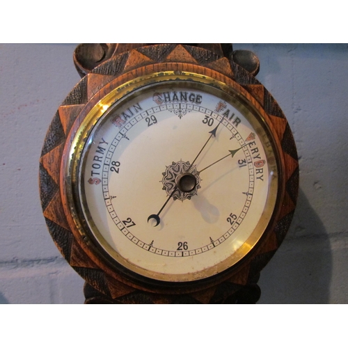 1055 - An Edwardian oak cased banjo barometer