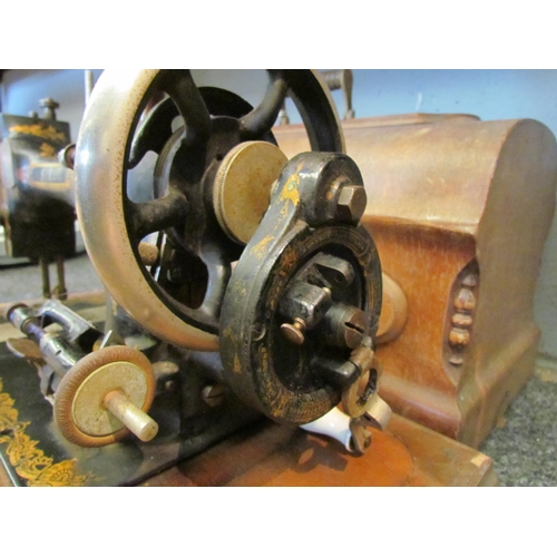 1060 - An early 20th Century Serata hand operated sewing machine, case with key