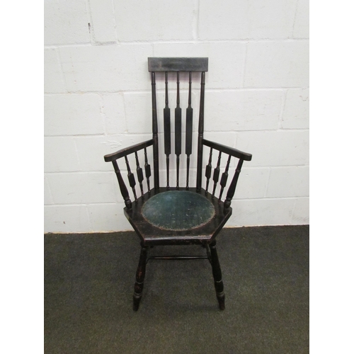 1076 - An Aesthetic/Arts & Crafts style ebonised chair on 'H' stretcher base. James Shoolbred ivorine label... 