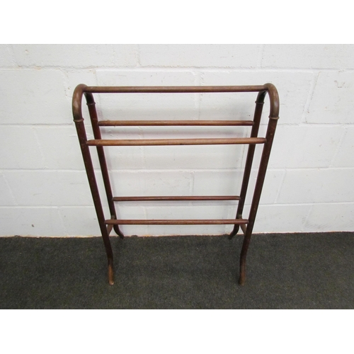 1105 - A mahogany towel rail, 91cm tall    (E) £20-30