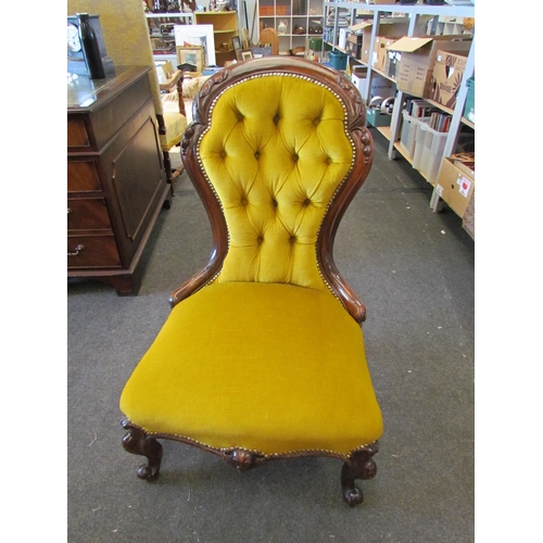 1113 - A late Victorian button back open armchair with gold upholstery stud detail