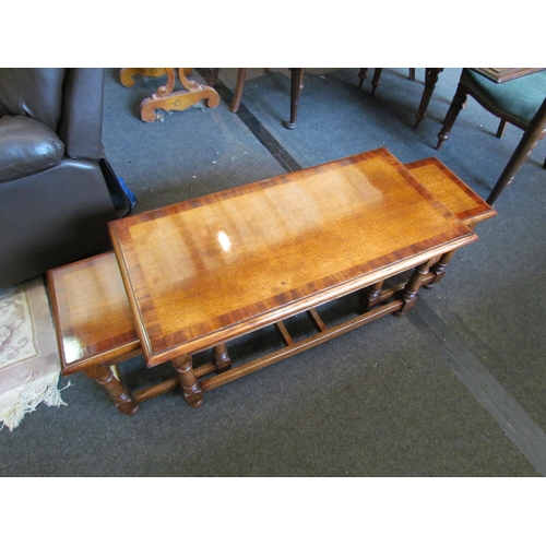 1117 - A Jacobean style crossbanded oak nest of three coffee tables, largest 45cm tall x 91cm long x 45cm w... 