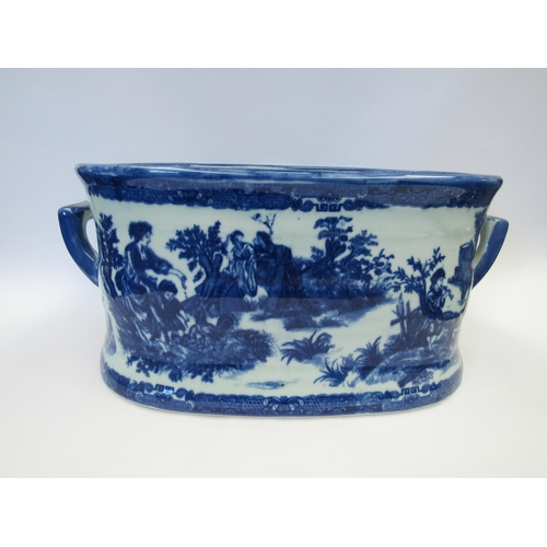 1003 - A blue and white ceramic foot bath with classical scenes, 21cm tall x 45cm long