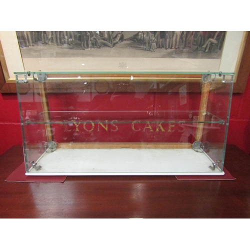 4055 - A Lyons Cake vintage glass display cabinet (missing doors), 38cm tall x 76cm long x 23cm deep