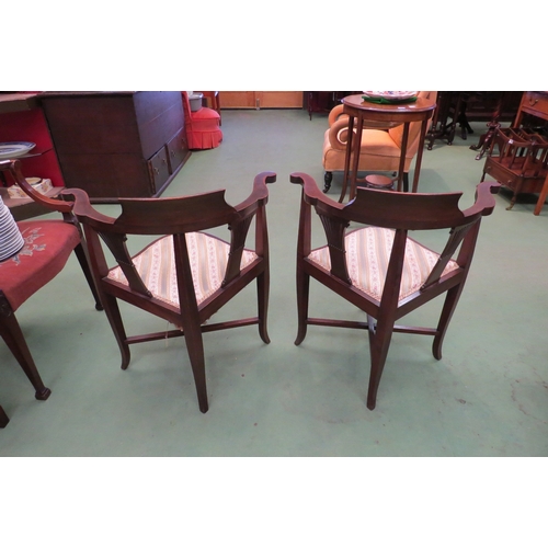 4059 - Three Edwardian mahogany corner chairs, urn marquetry panel, pierced splats, on shaped supports, one... 