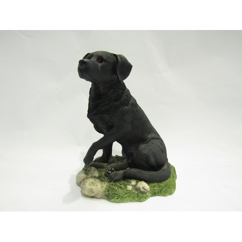 4091 - A Leonardo Collection figure of a black Labrador, 13cm tall  (E)  £10-15