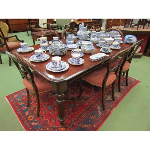 4102 - A Victorian mahogany dining table, fluted tapering legs set to original ceramic castors, together wi... 