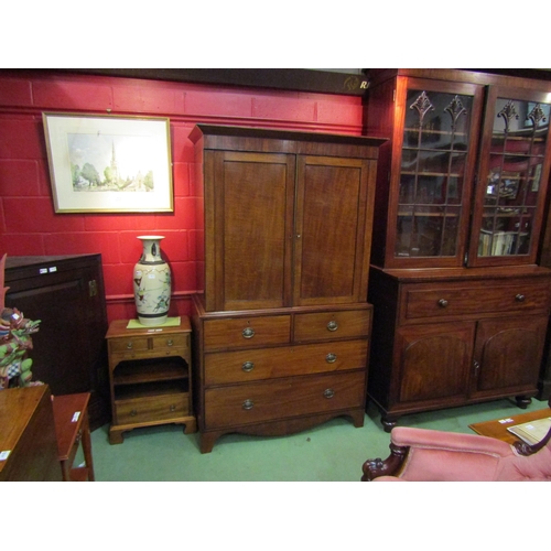 4121 - A Circa 1840 flame mahogany linen press with black line inlaid decoration, the two doors with key op... 