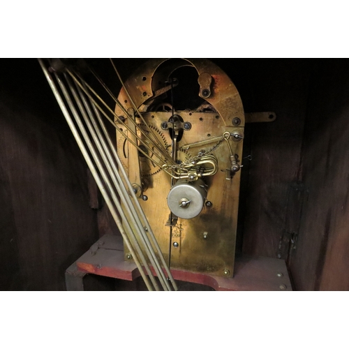 4143 - An eight day bracket clock with key and pendulum