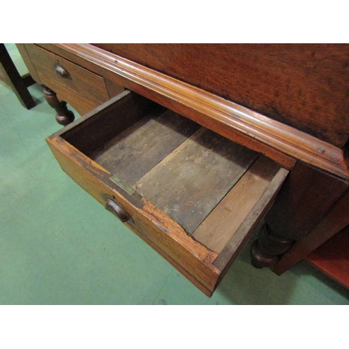 4188 - A late Victorian Anglo-Indian teak chest on base, the hinged lid over two drawers and turned legs jo... 