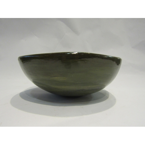 4243 - A heavy clay Studio pottery bowl, stamp mark to base, 22cm diameter  (R)  £0  (E)  £10-15