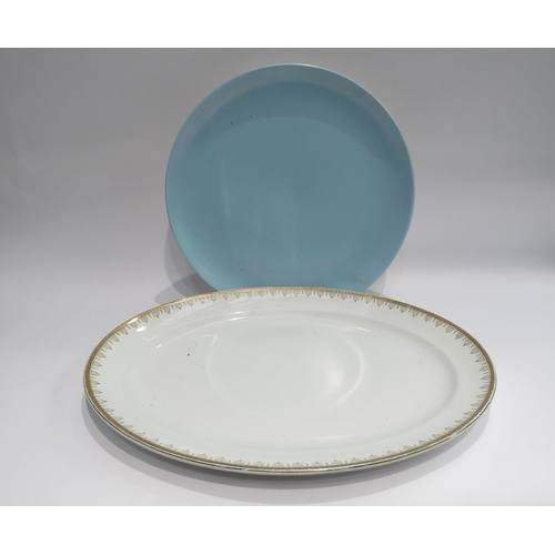 4014 - A Poole platter of circular turquoise form, 34cm diameter, and a Victorian meat plate with gilt embe... 