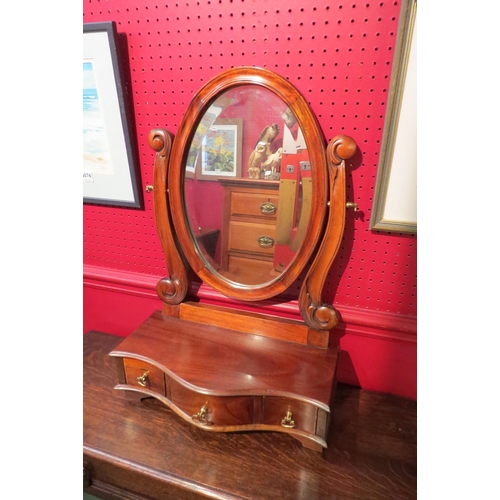 4077 - A hardwood dressing chest mirror with three drawer serpentine front