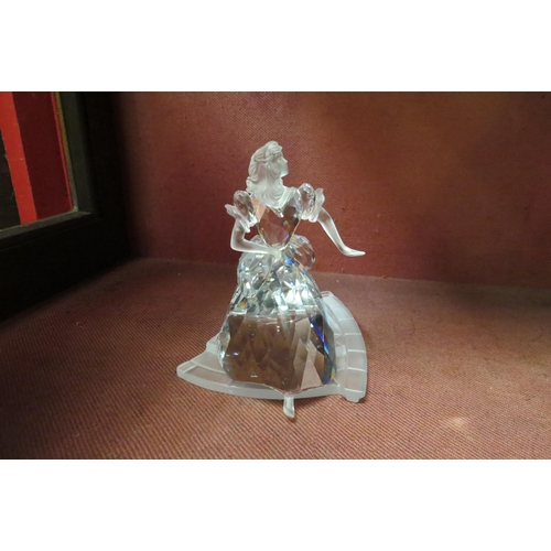 4117 - A Swarovski crystal figure of a young lady posing, boxed