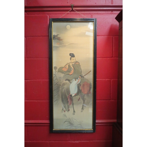 4118 - An Oriental painting on silk depicting a figure playing a flute on horseback, Edwardian framed and g... 