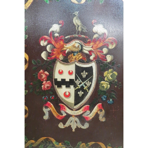 4144 - A gilt framed coach panel bearing family crest, 35cm x 26cm image size  (R)  £70