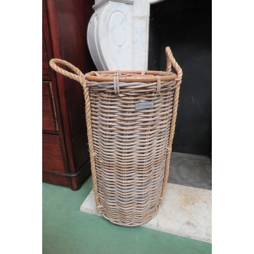 4145 - A wicker stick stand with rope handles, 61cm tall