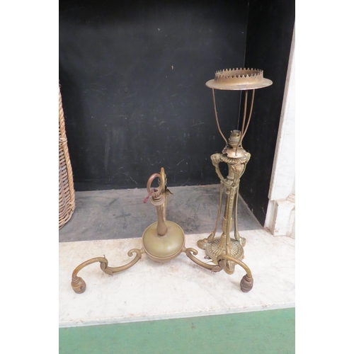 4147 - A 19th Century brass table lamp base with rams head and hoof supports and a three branch electrolier... 