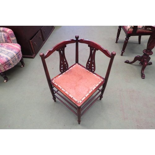 4160 - A walnut corner chair with pierced back supports