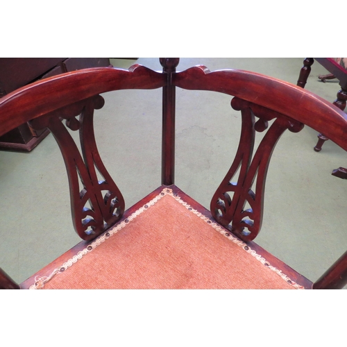 4160 - A walnut corner chair with pierced back supports