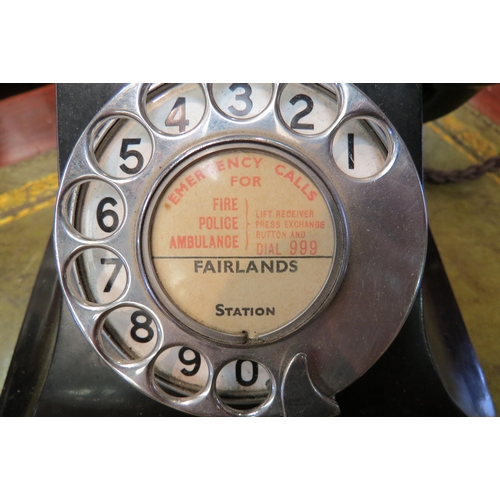 4167 - A vintage black bakelite telephone, Farlands paper dial centre