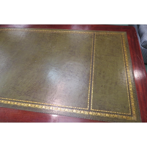 4168 - A mahogany gilt tooled leather topped two drawer desk, brass swan neck handles, 77cm tall x 137cm wi... 