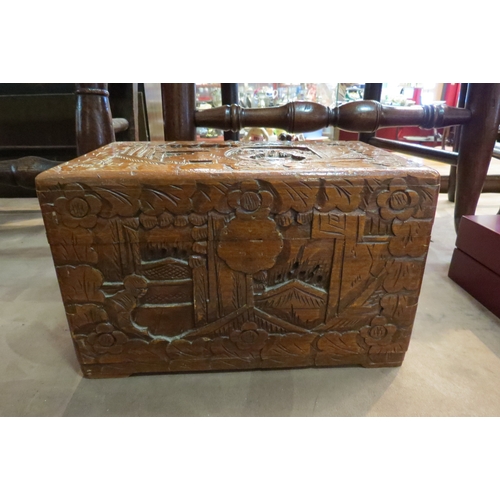 4204A - A set of three graduating 20th Century Oriental carved boxes with figural and external scenes, two a... 