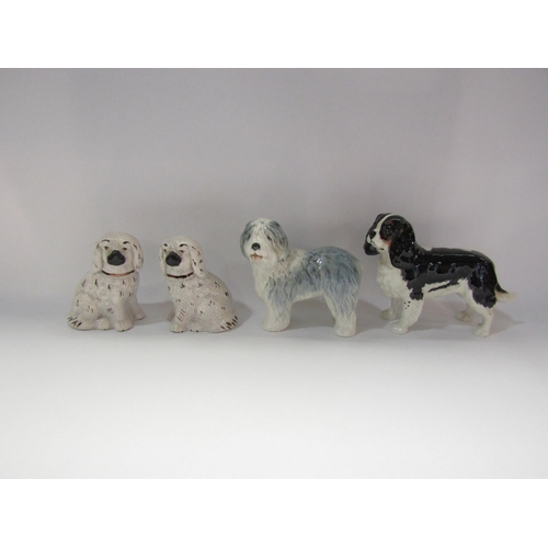 4228 - A pair of small Staffordshire dogs, a carved stone seal together with a Sylvac old English sheepdog,... 